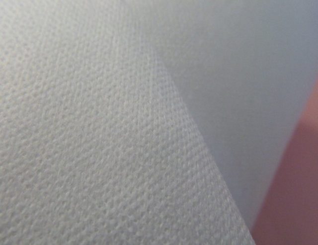 Non-woven iron-on interlining